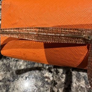 Tory Burch 56mm Sunglasses Case is a little compromised from direct Sun in car.